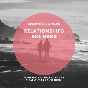 Couple by ocean holding hands
